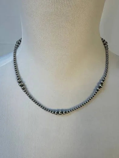 Machine made Navajo pearls